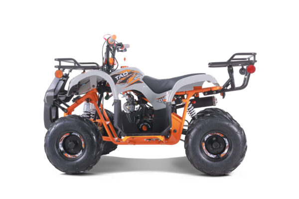 A white and orange atv is parked on the ground
