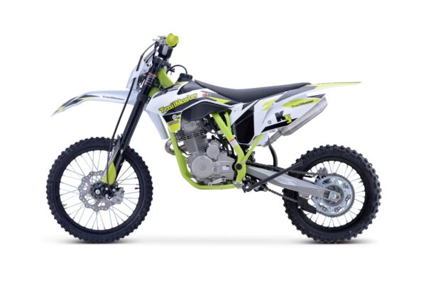 A dirt bike is shown with the seat down.