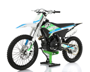 A dirt bike is shown with the seat up.