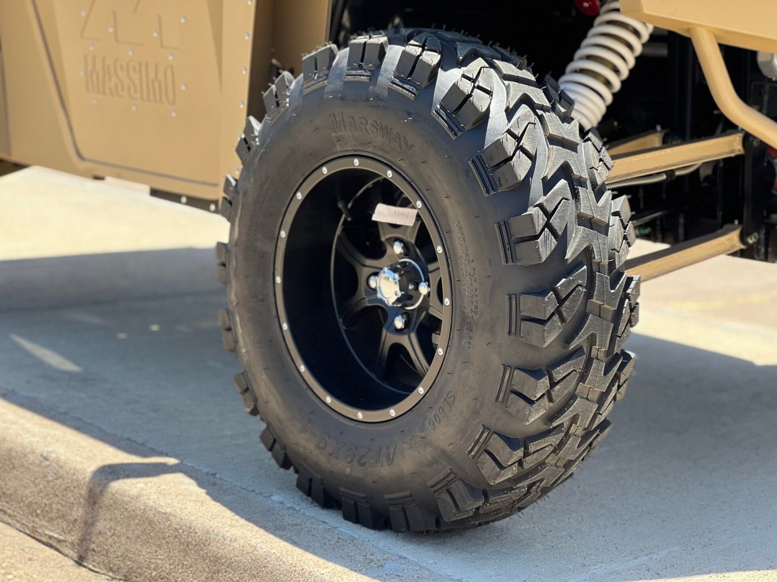 A close up of the tire on a vehicle