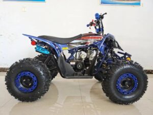 A blue and black atv parked in a room.