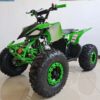 A green and black atv is parked in the room.