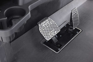 A close up of the pedals on a car