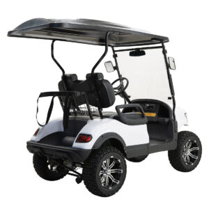 A white golf cart with a black top.