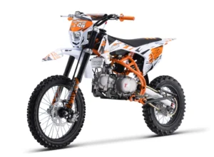 A dirt bike is shown with orange and white paint.