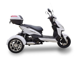 A white three wheeled motorcycle with a black seat.