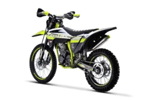 A dirt bike is shown with the lights on.