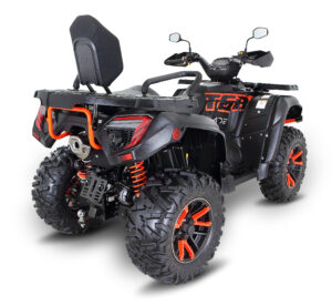 A black and red atv with a seat on the back.