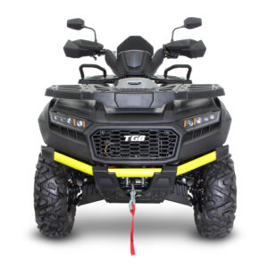A black and yellow atv with a red handle.
