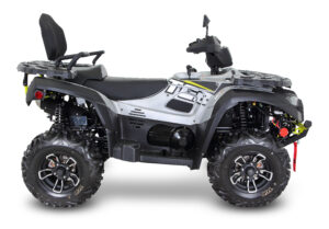 A silver atv with black wheels and seat.