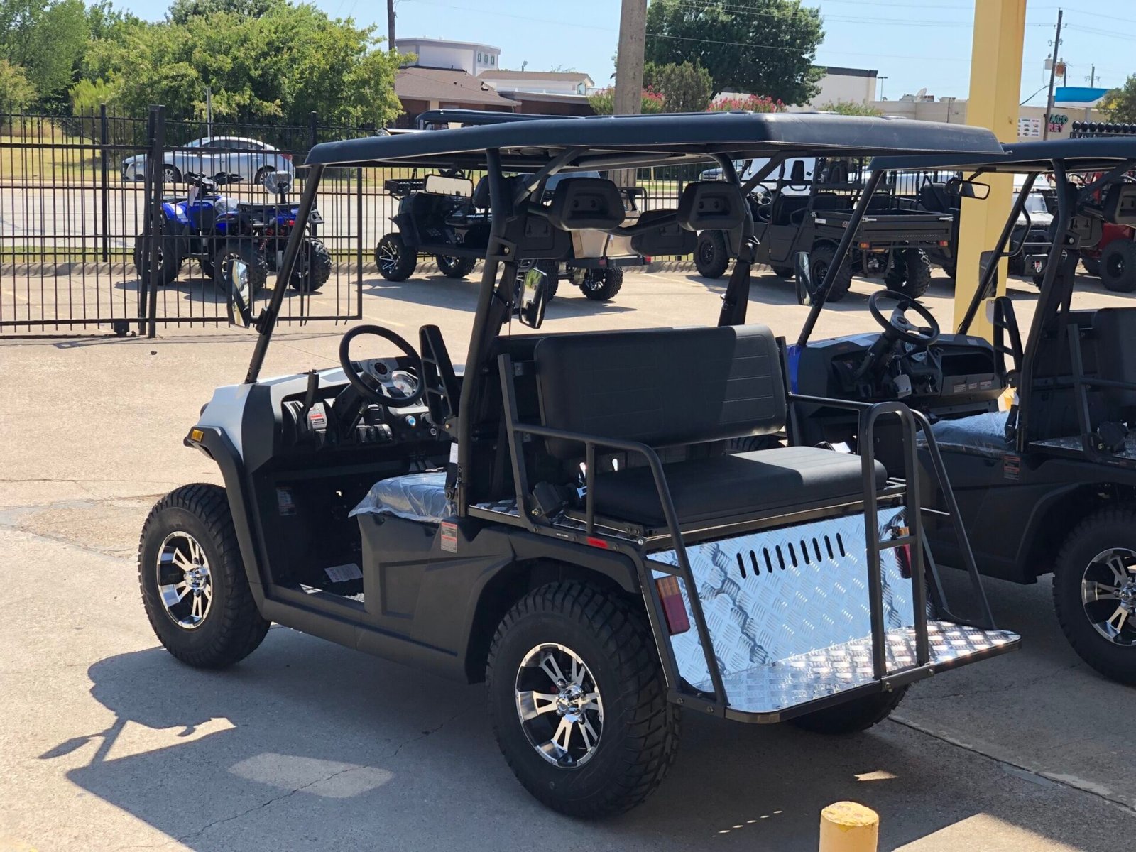 A golf cart with many lights on it