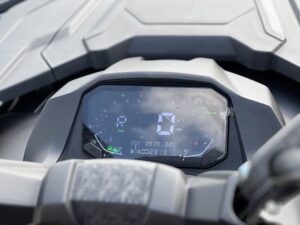 A close up of the dashboard on a motorcycle