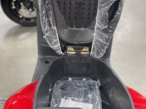 A seat in the back of a motorcycle.