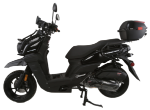 A black scooter with a seat and back bag.