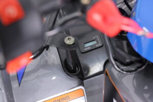 A close up of the power cord on a motorcycle