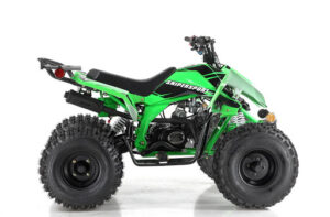 A green atv is parked on the ground
