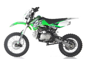 A green dirt bike is parked on the ground