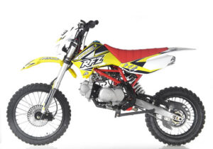 A yellow dirt bike with red and black accents.