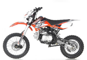 A dirt bike is shown with the seat up.