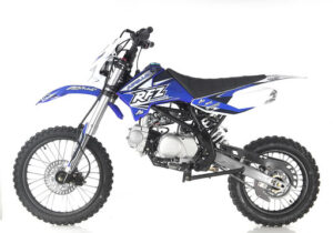 A blue dirt bike is parked on the ground