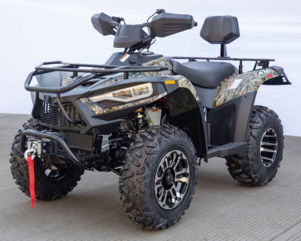 A black and gray four wheeler with two seats.