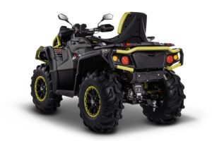 A black and yellow four wheeler with a seat up.