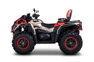 A red and white four wheeler with big tires