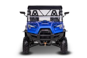A blue four wheeler with its front windshield up.