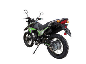 A green and black motorcycle is parked on the ground.